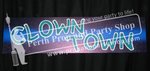 10-"CLOWN TOWN" sign